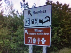 Antiques centre brown sign